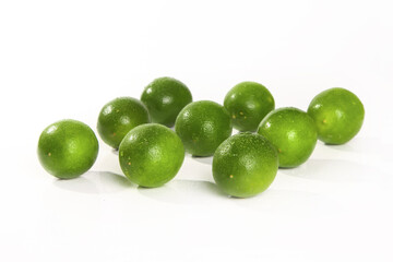 Fresh Hainan Perfumed Limes on White Background - Tropical Citrus Fruit Collection