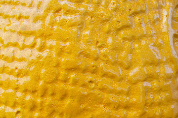 Gold ceramic surface texture background close up