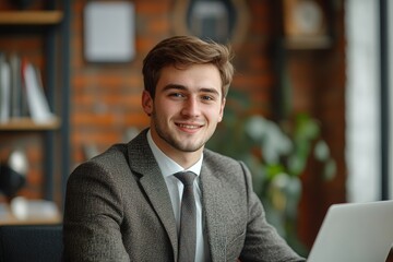 Smiling young man businessman in a business suit sits and works in the office on a laptop online, texts, chats with partners, clients, Generative AI