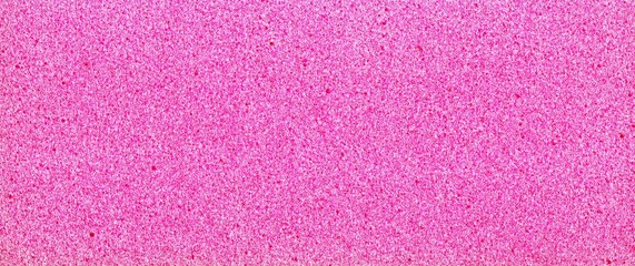 Close-up texture of pink protective foam padding, cushioning material for packaging, safety, and shock absorption concepts.