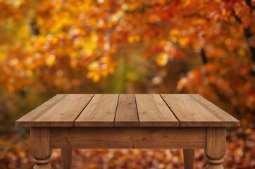 Naklejka premium Empty wooden table in autumn forest with blurred orange leaves background