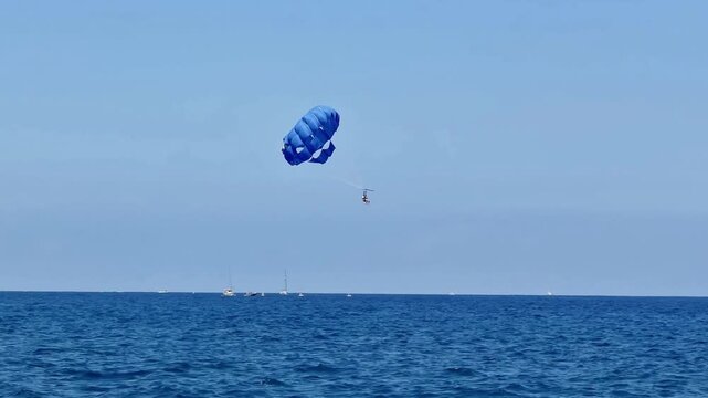 Experience the thrill of parasailing high above the sparkling blue waters during your unforgettable adventure
