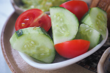 Fresh vegetables served in a bowl during a meal