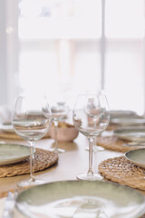 Empty wineglasses on a beautiful cutlery interior restaurant nobody on the frame close up still