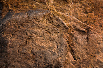 Stone brown texture granite, gray wall