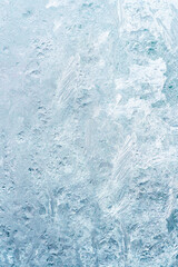 Frozen Ice Flower Formations On Window Pane During Winter Freeze