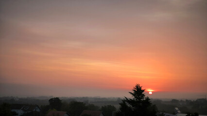 colorful sunset sunrise sky over the Danube river and city of Novi Sad