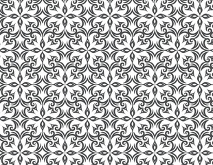 A gray and white ornamental pattern with symmetrical floral and arabesque motifs.