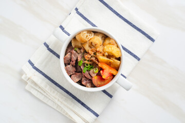 Soto Daging. Soto meat is a soupy dish made from beef stock seasoned with various spices. Perfect for recipes, articles or any cooking content.