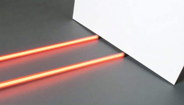 A curved red laser beam arcs elegantly from the bottom left to the top right, creating a slight reflection and glow. The beam is centered in the frame, with a black-to-transparent gradient background 