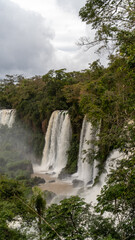 A Dynamic and Mystical Scene of Iguazu Falls Filled with Water Mist