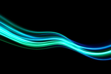 Obraz premium Abstract glowing teal and blue light streaks wave design on black background