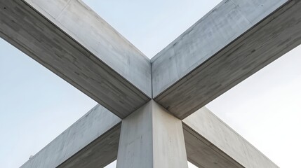 Obraz premium Abstract perspective of modern concrete architectural structure forming an intersecting cross design, highlighting minimalism, geometry, symmetry, and industrial style with clean lines.