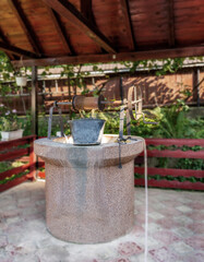 Concree water well with manual pilley and collection bucket