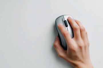 A hand holding a silver computer mouse on a white background simple and clean design