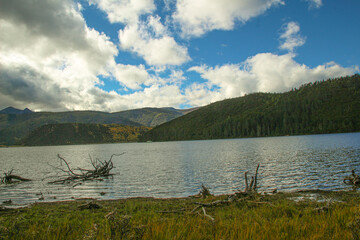 Colorful hills and blue lakes create a serene panorama
Pudacuo National Park, Yunnan, China, Shangri-La