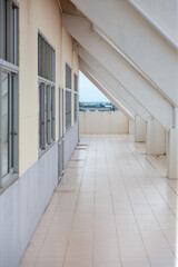 Obraz premium Modern building interior corridor with doors and windows