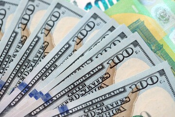 Big pile of Euro and USD banknotes. Many european and united states dollars