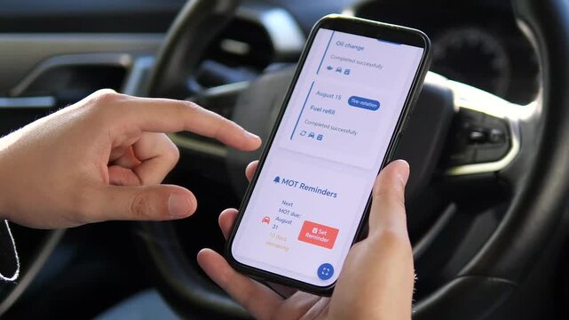 A driver inputs service details into a maintenance tracker app, emphasizing organization and responsibility. Perfect for car enthusiast content or DIY upkeep guides.