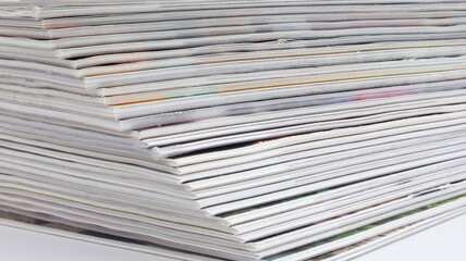 Stacked sheets of paper and close-up for copy space