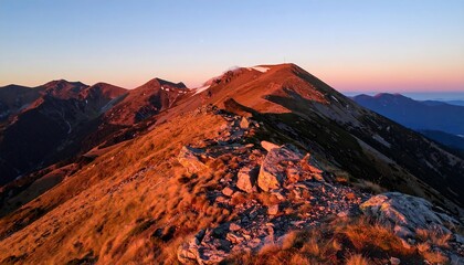 Fototapeta premium Mountain Ridge and a Sunrise with a Red and Powerful Look