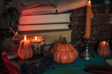 Halloween Pumpkin and other orange Candles, Autumn decoration, or mystical stuff