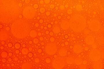 Macro microscope Red bubble texture, Close-up Green bubbles and drops oil background . blue green water bubbles, close up Red oil drop for cosmetic