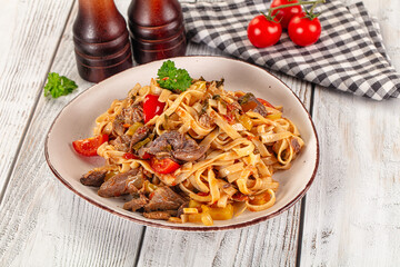 Asian udon noodles with beef