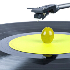 Yellow sphere on turntable record