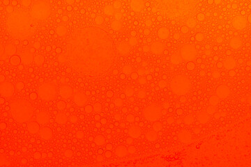 Macro microscope Red bubble texture, Close-up Green bubbles and drops oil background . blue green water bubbles, close up Red oil drop for cosmetic