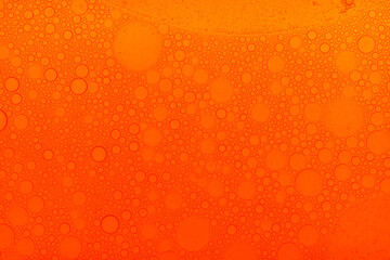 Macro microscope Red bubble texture, Close-up Green bubbles and drops oil background . blue green water bubbles, close up Red oil drop for cosmetic