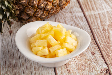 Sweet canned pineapple fruit pieces