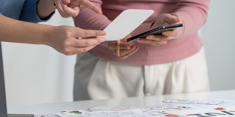 UX and UI Design Collaboration with Smartphone and Sketches