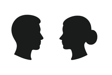 Silhouettes of man and woman facing each other in vector design