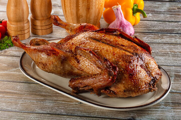 Baked with spices whole duck