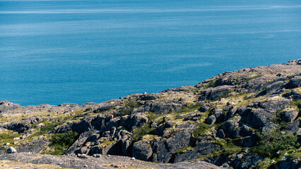 landscape Russian North view in the tundra with a mountain river and a lake in the mountains