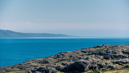 landscape Russian North view in the tundra with a mountain river and a lake in the mountains