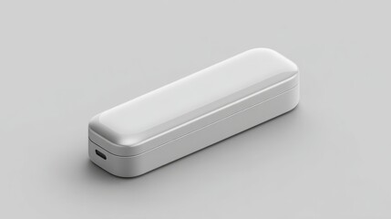 Minimalist communication device with a sleek design and polished surface on a neutral backdrop.
