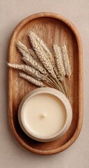 Oval tray holds candle and wheat