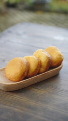 Homemade Fried Donuts on a Wooden Tray