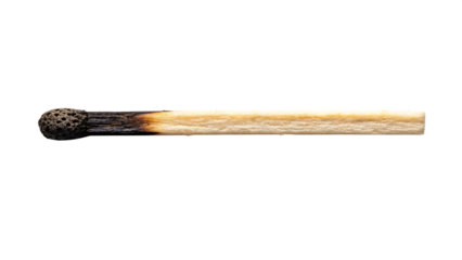 A matchstick with burnt tip and ash residue