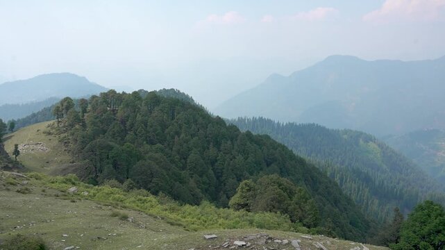 India's breathtaking mountain views boast majestic peaks, lush valleys, and serene landscapes in Shoja Himachal Pradesh india.	