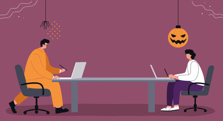 Two men work on laptops in a festive office decorated for Halloween, combining productivity with seasonal celebration. Ideal for business, technology, or holiday themes.