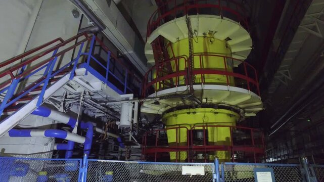 Industrial Equipment Inside The Turbine Hall Of The Chernobyl Nuclear Power Plant In Ukraine. Low Angle Shot
