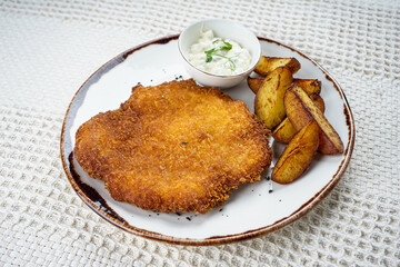 meat chop on a plate with potatoes