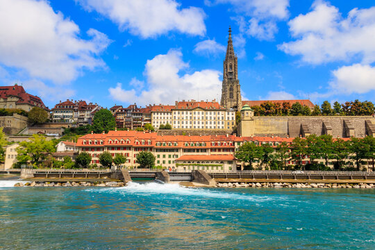 View of the old town of Bern with cathedral and dam on the Aare river, Switzerland