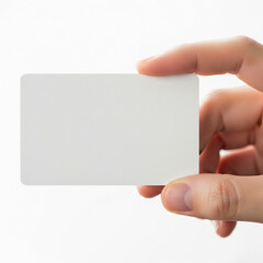 Obraz premium A versatile, close-up shot of a hand holding a blank card. This image is perfect for announcements, business