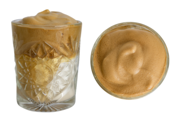 Glass of popular Korean iced dalgona latte shown from side and top view, isolated on white background with clipping path, perfect for beverage design, cafe branding, or editorial use.