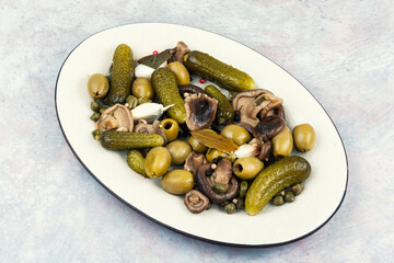 Plate with salty snacks.