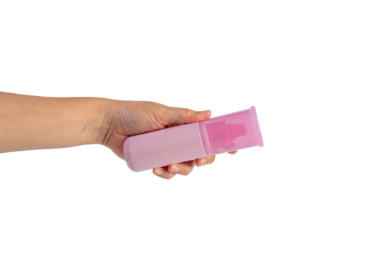 Pink product bottle in hand on transparent background
